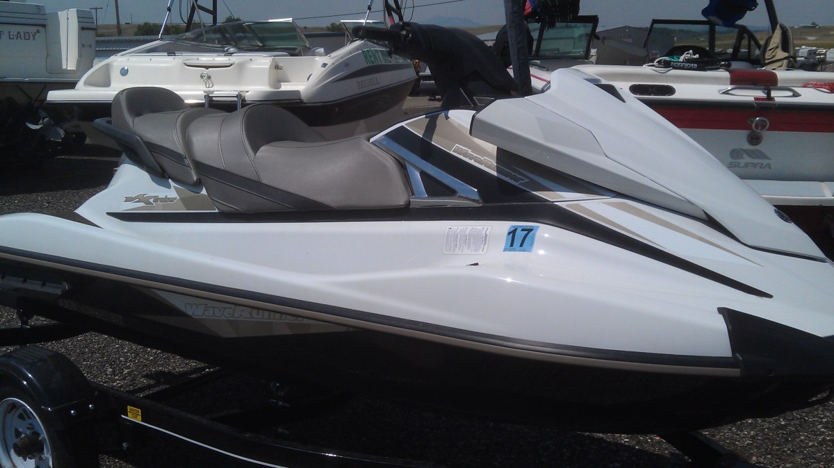 a boat sitting on top of a car